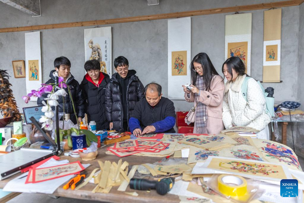 In pics: Inheritor of Liangping New Year Woodblock Prints in SW China's Chongqing